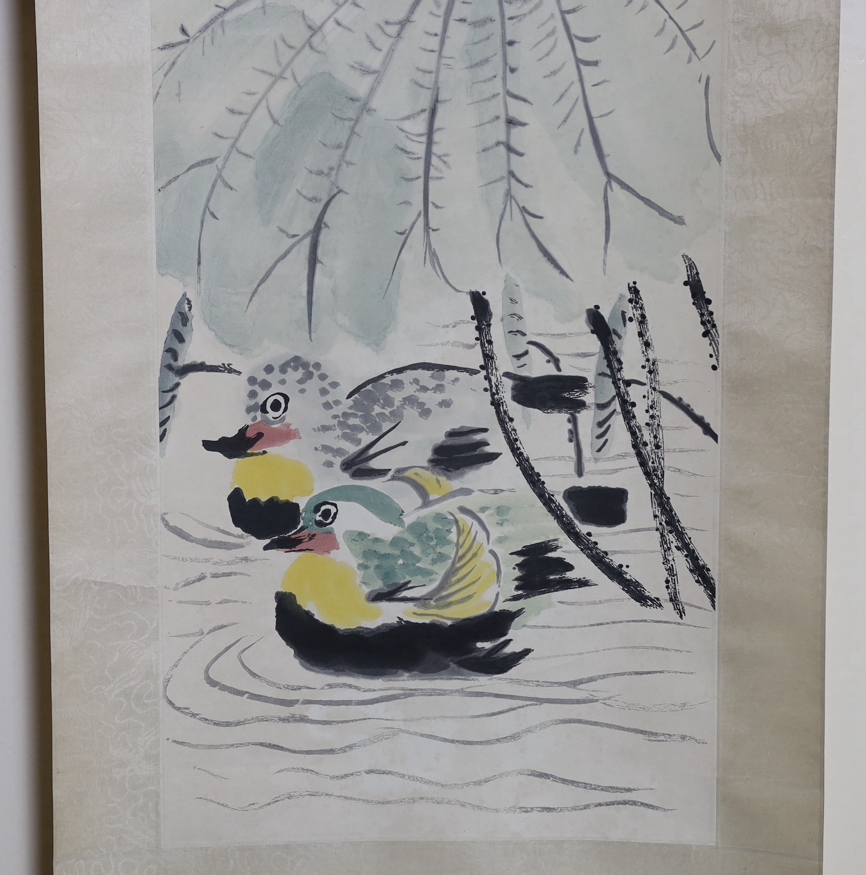 After Qi Baishi (1863-1957), Mandarin ducks, printed scroll, published by Tianjin Arts & Crafts Export Company, 1959, image 103cm x 33cm